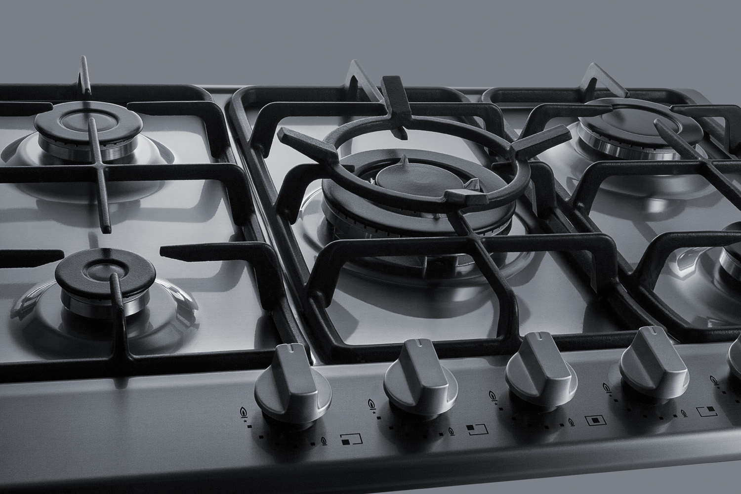 5-burner gas cooktop made in Italy in stainless steel finish with sealed burners, cast iron grates, wok stand, and stainless steel frame to allow installation in 30